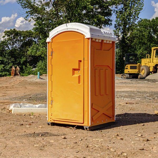 how often are the portable restrooms cleaned and serviced during a rental period in Lupton MI